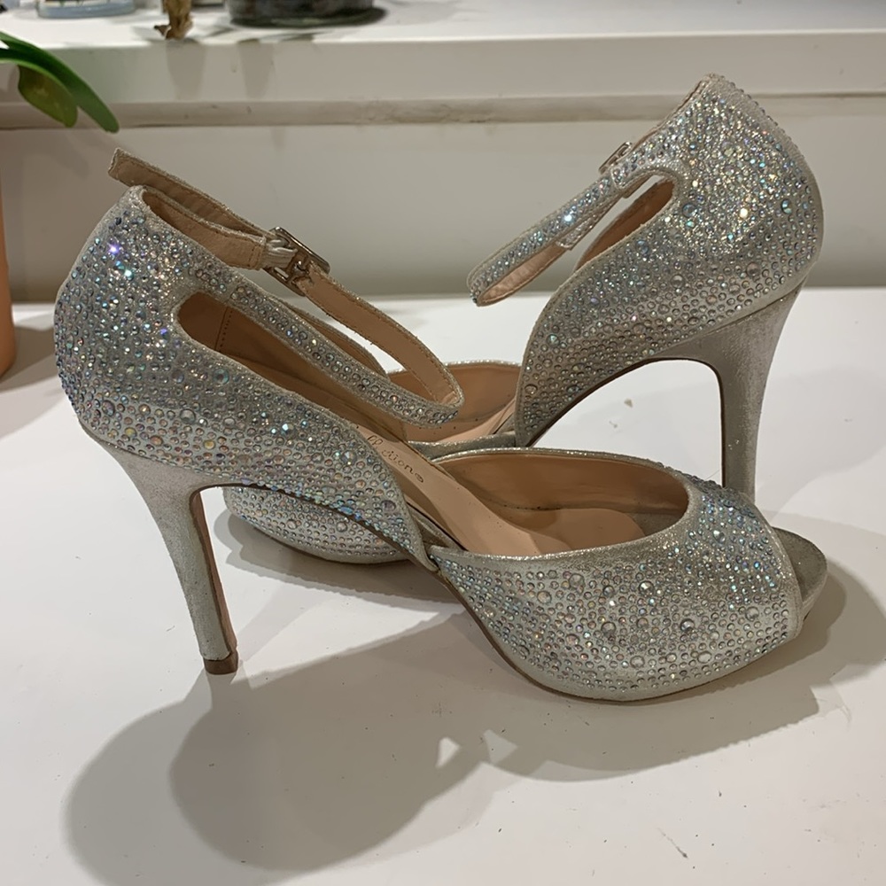 De Blossom Collection beautiful Rhinestone silver heels. 4” heel, Size 7-1/2.